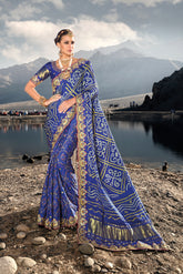 Pure gazzi Royal Blue hand weaved saree with real mirror, moti & cut dana work hand embellished work